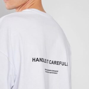 REMERA OVER HANDLET